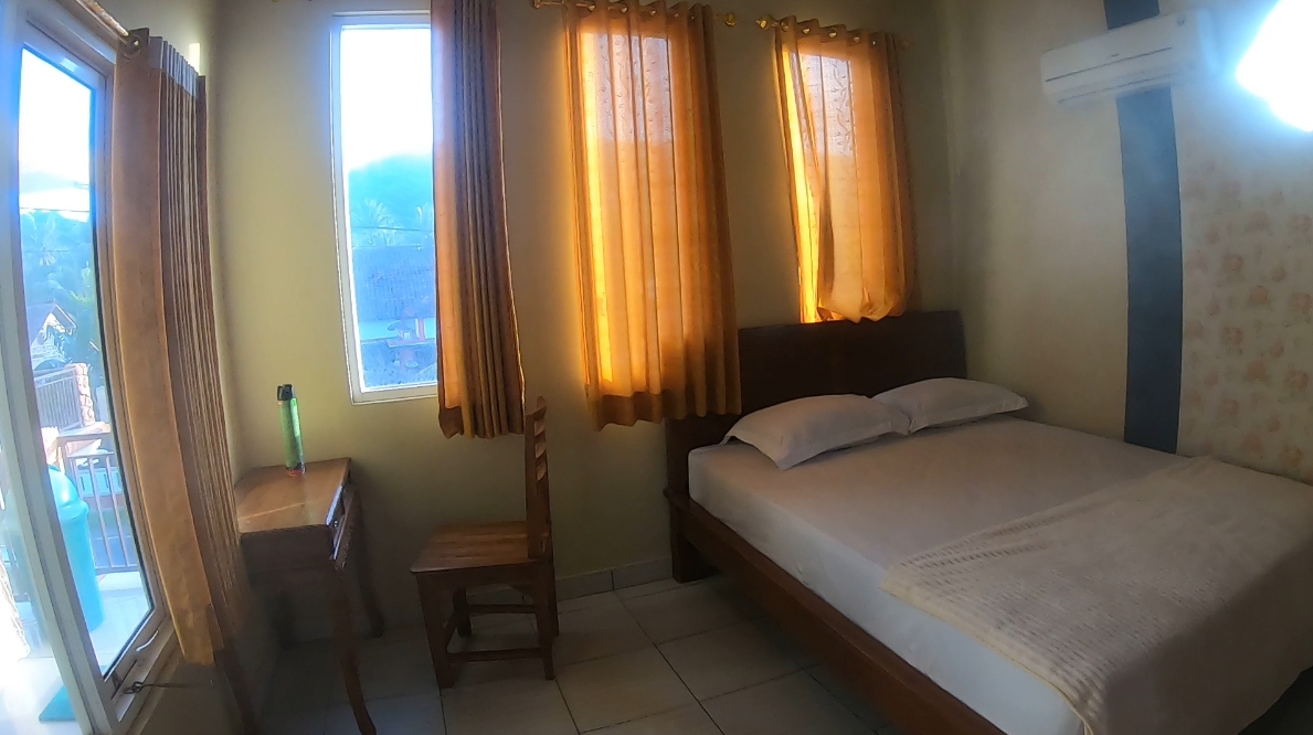 Kamar Windri Homestay di Homestay AC (Pusat Kota)